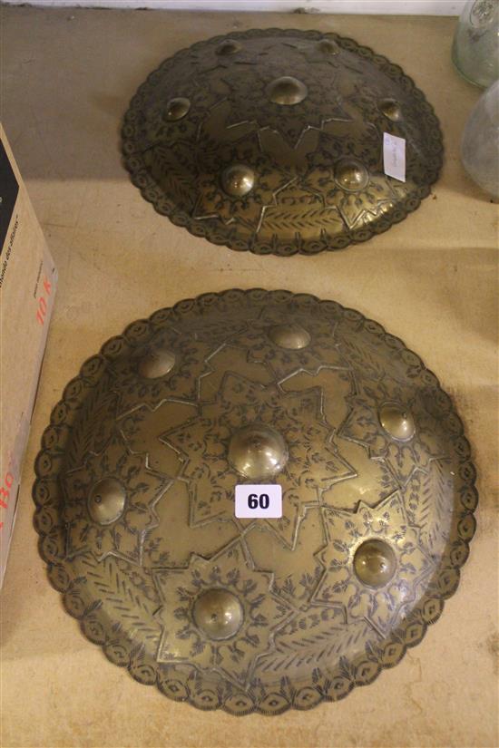 2 Eastern brass shields